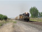 NS 7554 leads an eastbound manifest out of Nampa